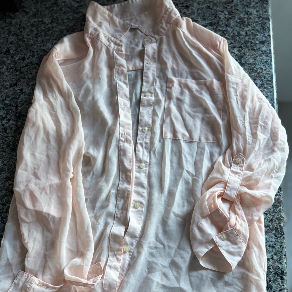 Delia’s peach blouse